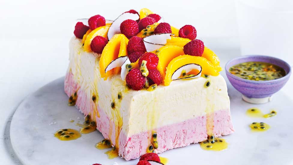 Mango and raspberry coconut semifreddo with passionfruit pulp