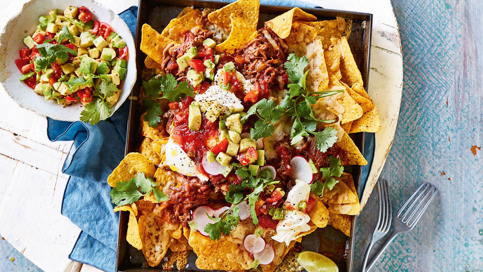 Pulled beef nachos served with salsa