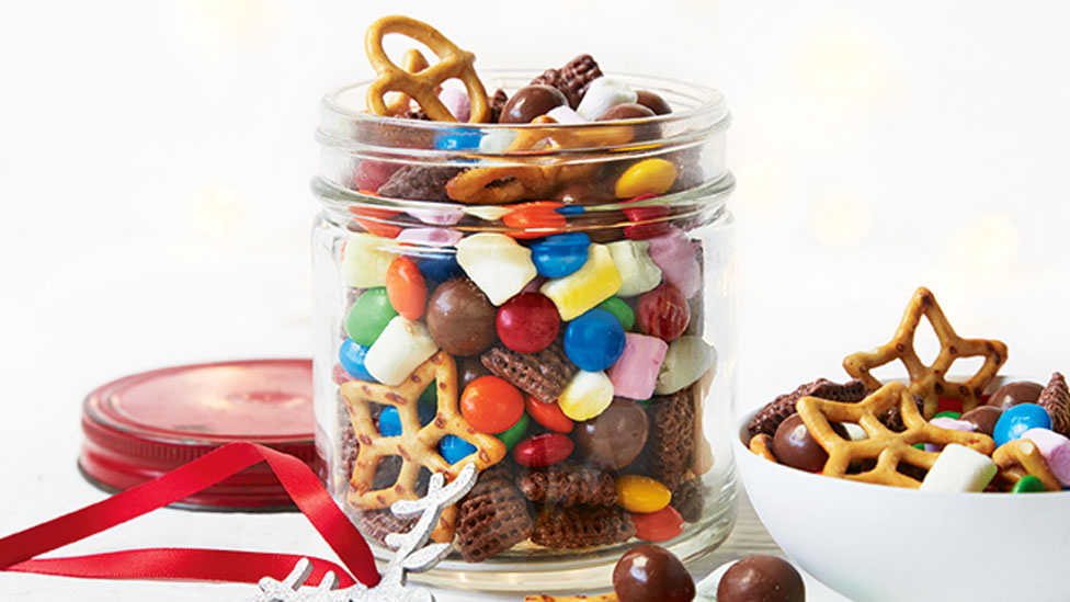 A jar of Maltesers, M&M’s, marshmallows, pretzels and cereal 