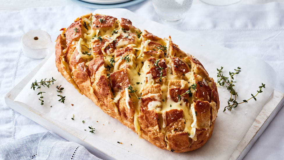 Brie and caramelised onion pull-apart bread with a cheeseboard pattern on top