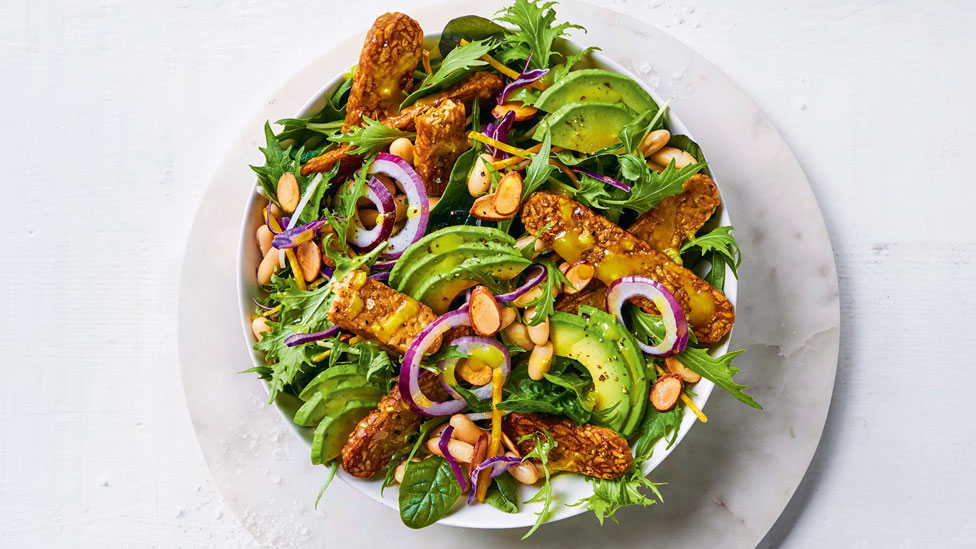 Crispy tempeh and bean salad in a bowl