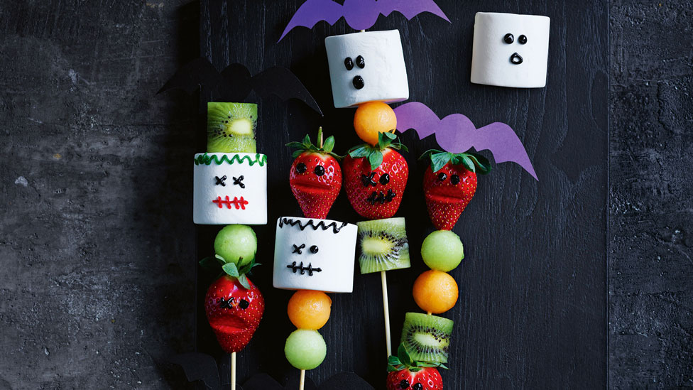 Four spooky fruit kebabs