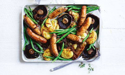 Bangers and smashed potato tray bake