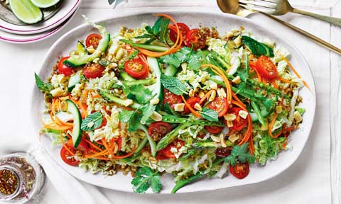 Asparagus and wombok salad on a dish.