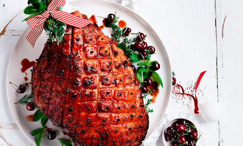 A roast ham with a cherry glaze