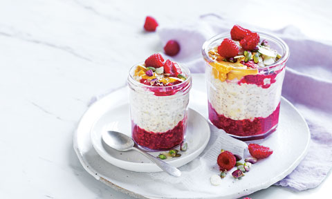 Peanut butter and raspberry overnight oats topped with more raspberries