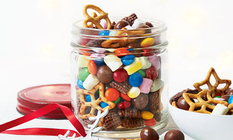 A jar of Maltesers, M&M’s, marshmallows, pretzels and cereal 