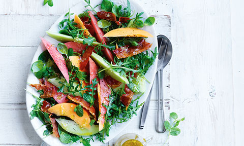 Crispy prosciutto and melon salad on a dish.