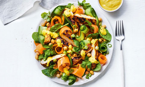 Chicken tikka salad with yoghurt mixture and coriander