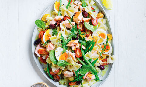 Salmon Nicoise pasta salad with eggs cut in halves