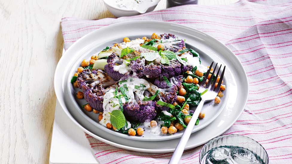 Cauliflower steaks with spinach and chickpeas