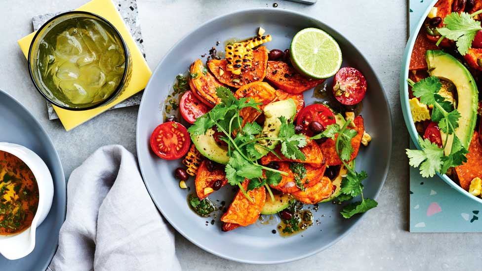 Sweet potato salad with black beans and corn cobs