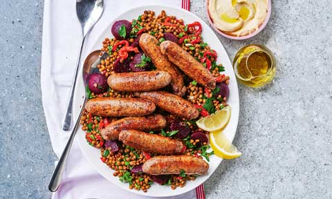 Beef sausages with beetroot and lentil salad