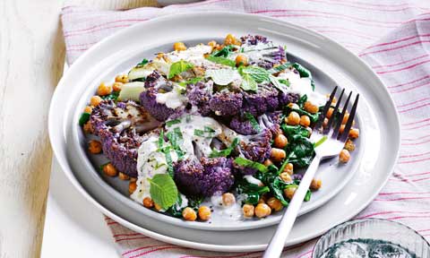 Cauliflower steaks with spinach and chickpeas