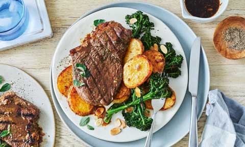 BBQ steaks with air fryer potato and greens