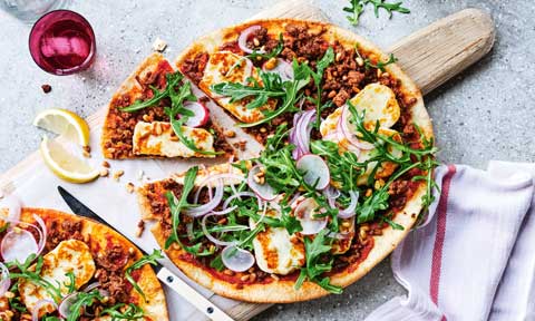 Spiced lamb and haloumi pizzas