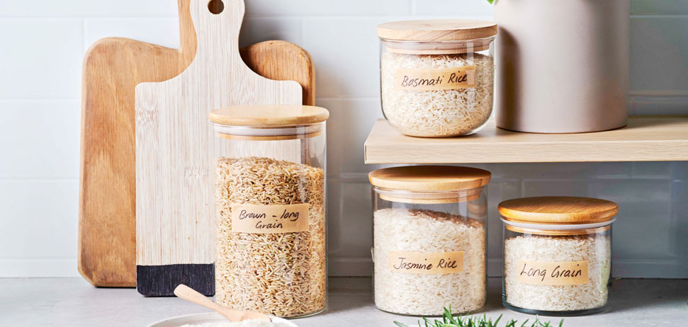 Different grains of rice displayed in jars