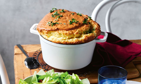 Triple-cheese soufflé with celery and hazelnut salad