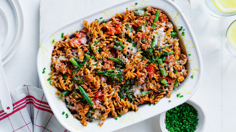 Beef and green veggie pasta bake sprinkled with chives