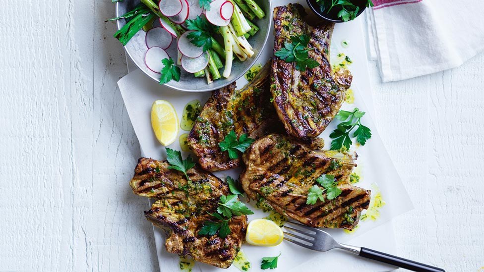 Curtis Stone's lamb chops with lemony asparagus, served with lemon wedges and radish