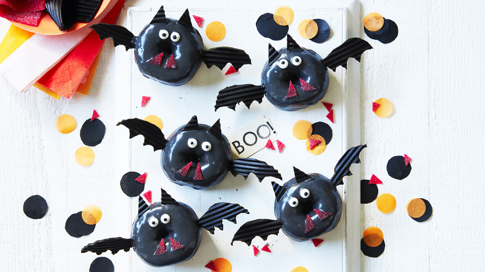 Five Halloween bat donuts