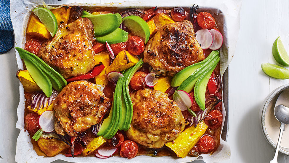 Mexican-style chicken tray bake with avocado and radish