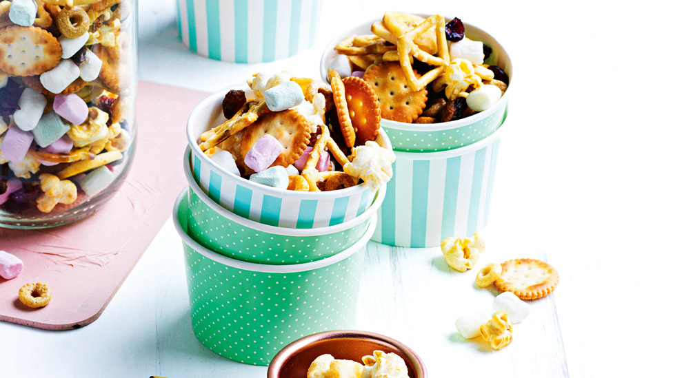 Two cups of popcorn trail mix