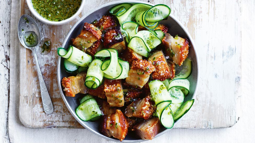 Pork belly bites with cucumber and sweet and spicy sauce