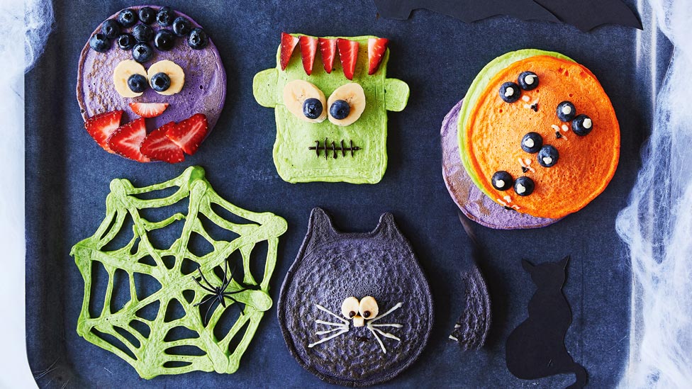 Six spook-tacular pancakes in black cat, spider web, spooky face and frankenstein