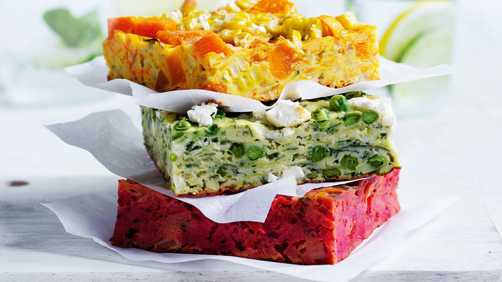 Three slices of beetroot and zucchini slice stacked
