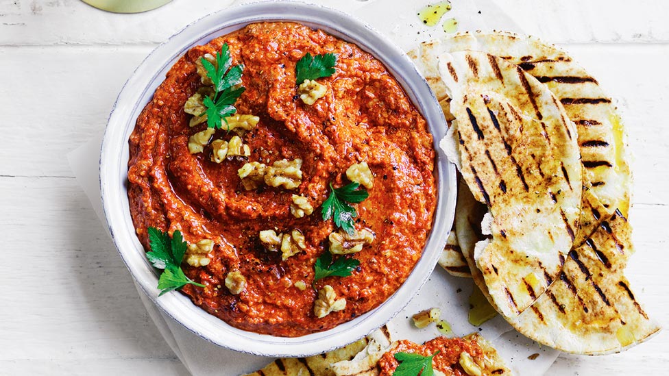 Char grilled capsicum dip with walnuts and parsely, served with grilled pita bread