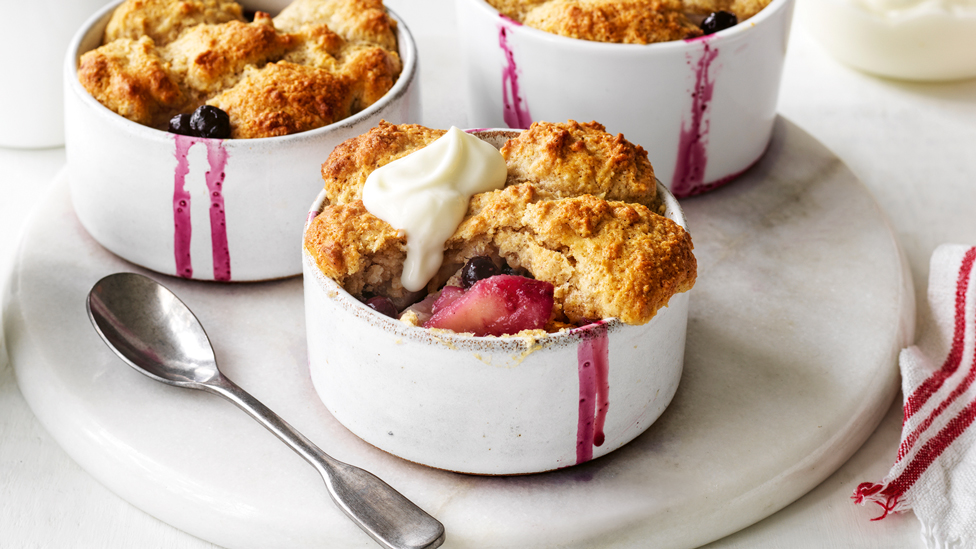 Pear and blueberry cobblers with warm yoghurt topping