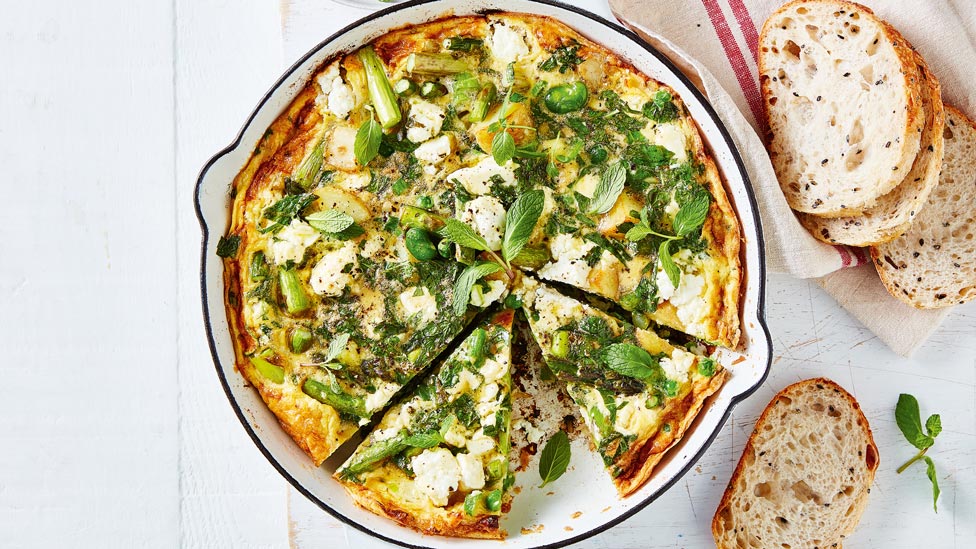 Spring vegetable frittata cut into wedges