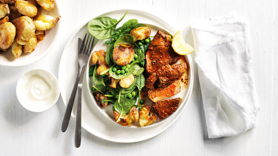 Tandoori lamb with smashed potatoes, peas and spinach