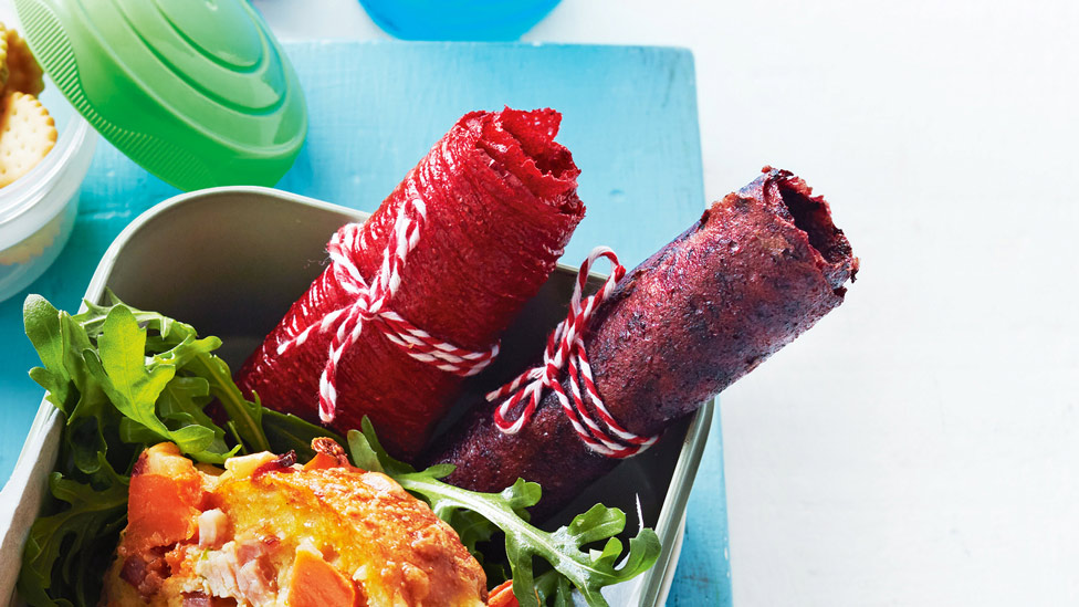 Strawberry and blueberry roll ups in a box