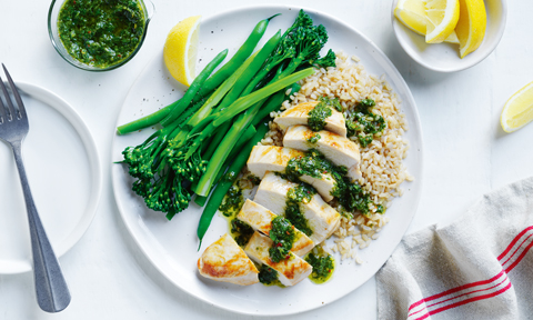 Chicken and baby broccoli on rice drizzled with chimichurri