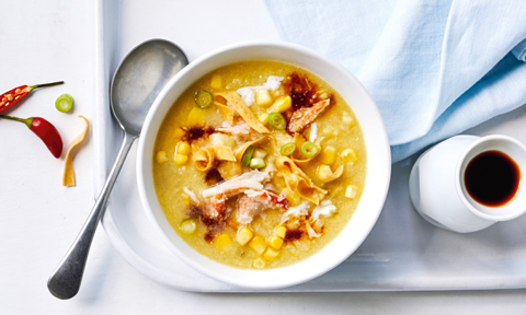 Chicken and corn soup with crab served with soy sauce mixture