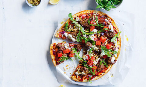 Moroccan-style beef pizzas cut in wedges