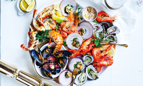 A must-try seafood platter with lobster, scallops, mussels, mignonette and apple cider dressing