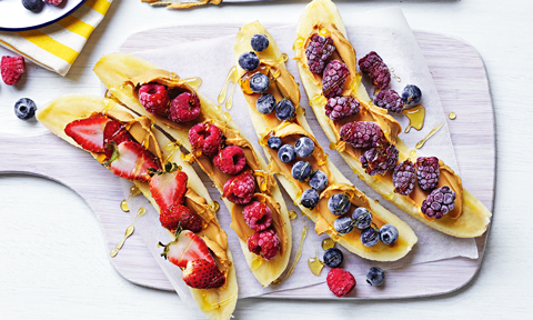 Peanut butter and berry on four frozen bananas