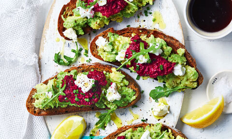 Three new avo toasts with chive and rocket leaves