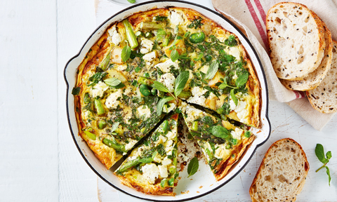 Spring vegetable frittata cut into wedges