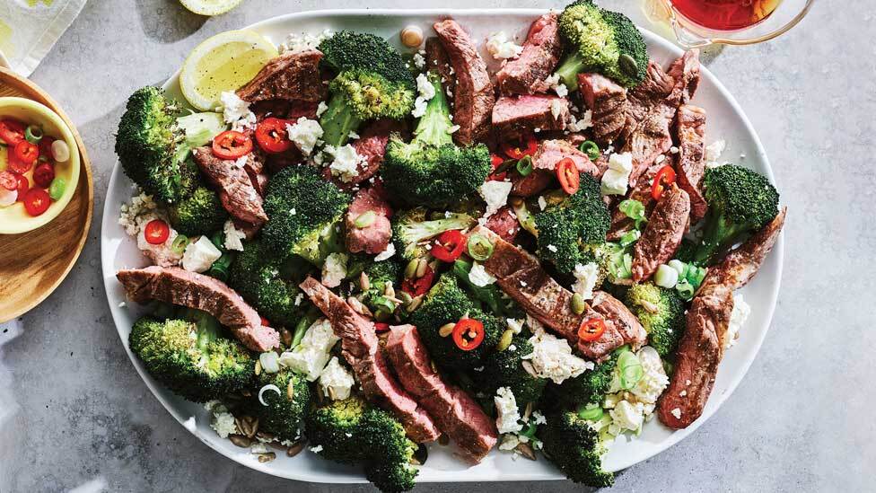 BBQ lamb with warm broccoli salad