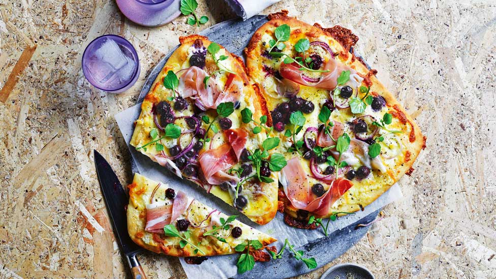 Blueberry and prosciutto pizza