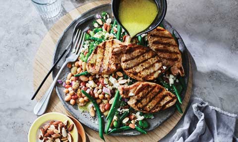 Pork steaks with mixed bean salad