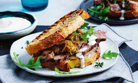 Curtis Stone’s steak sandwiches with caramelised onions