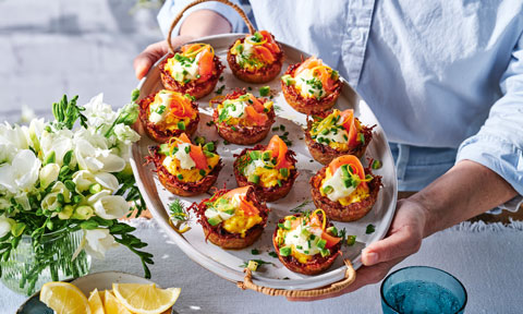 Hash brown cups with  salmon and scrambled eggs
