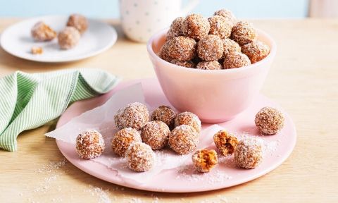 Bliss balls served in a pink bowl 