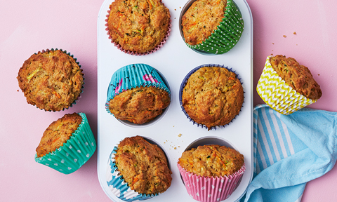 Muffins in cases served in a muffin baking tray