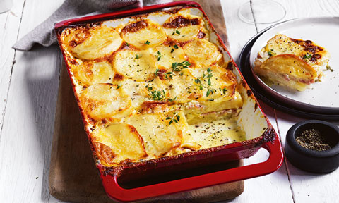 Potato and leek gratin served in a baking dish